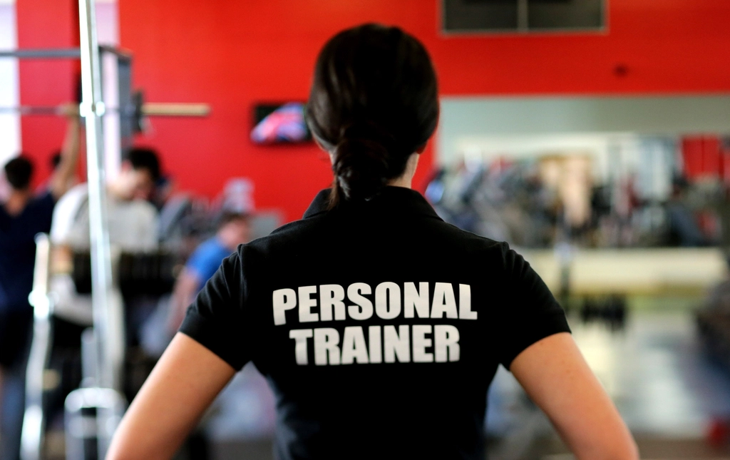 Personal trainer in the gym