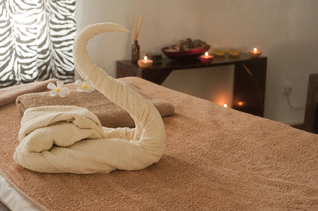 Treatment room with folded towels