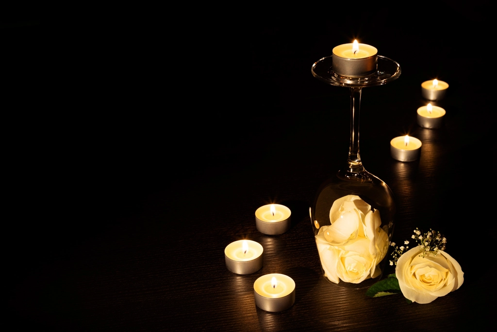 Candles glowing in a dark room